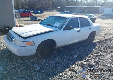 2003 Ford Crown Victoria Police z USA, uszkodzony, nr VIN 2FAFP71WX3X174655